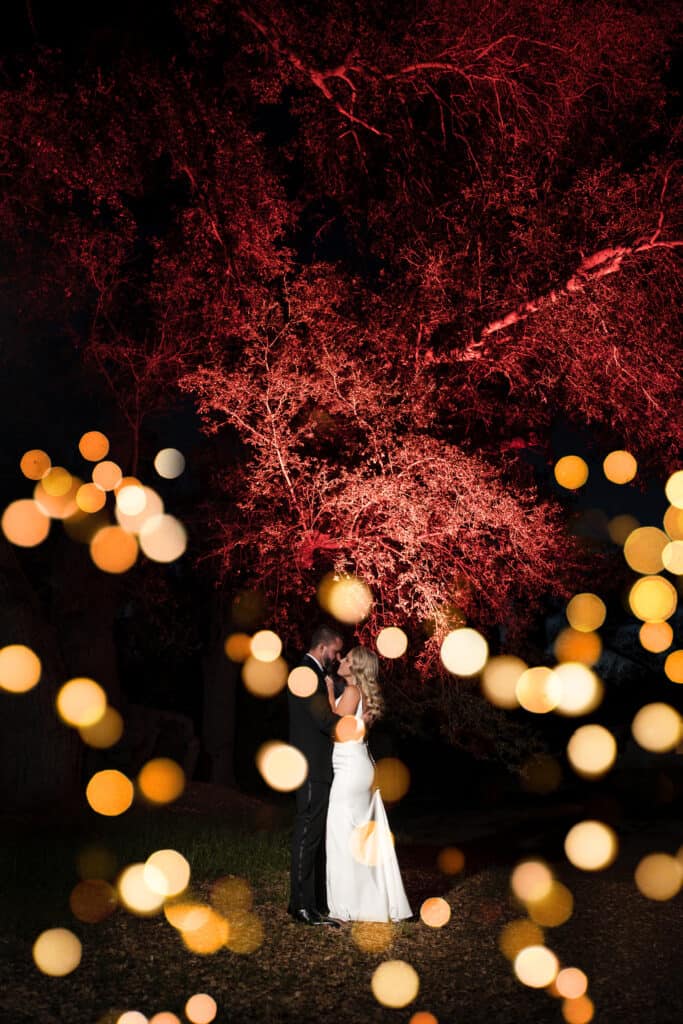 A nighttime portrait of a bride and groom on their wedding day in Temecula, CA
